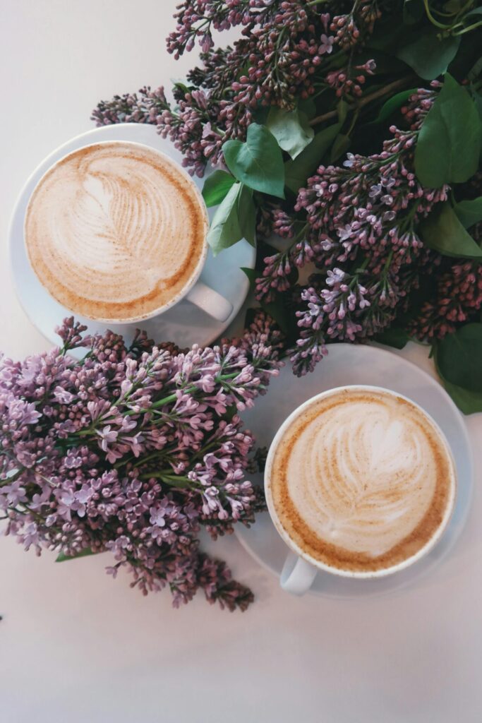 Two cups of Coffee with Flowers